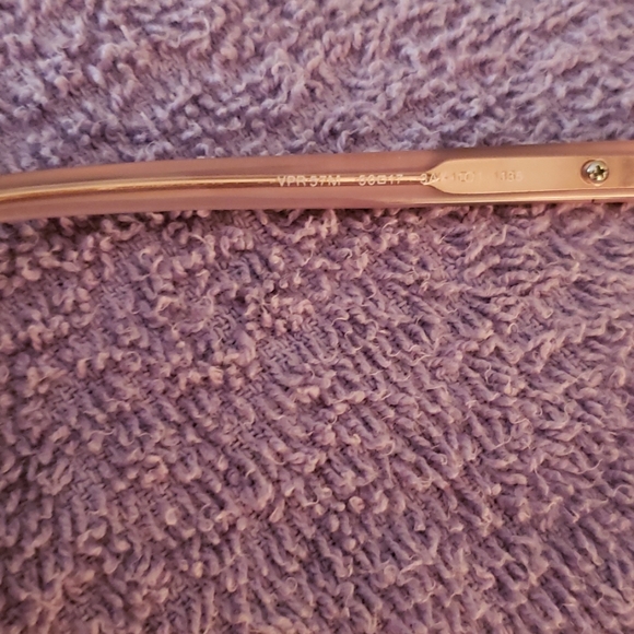 100% authentic Prada eyeglassframes only. Has a prescription in them now. - Picture 6 of 9